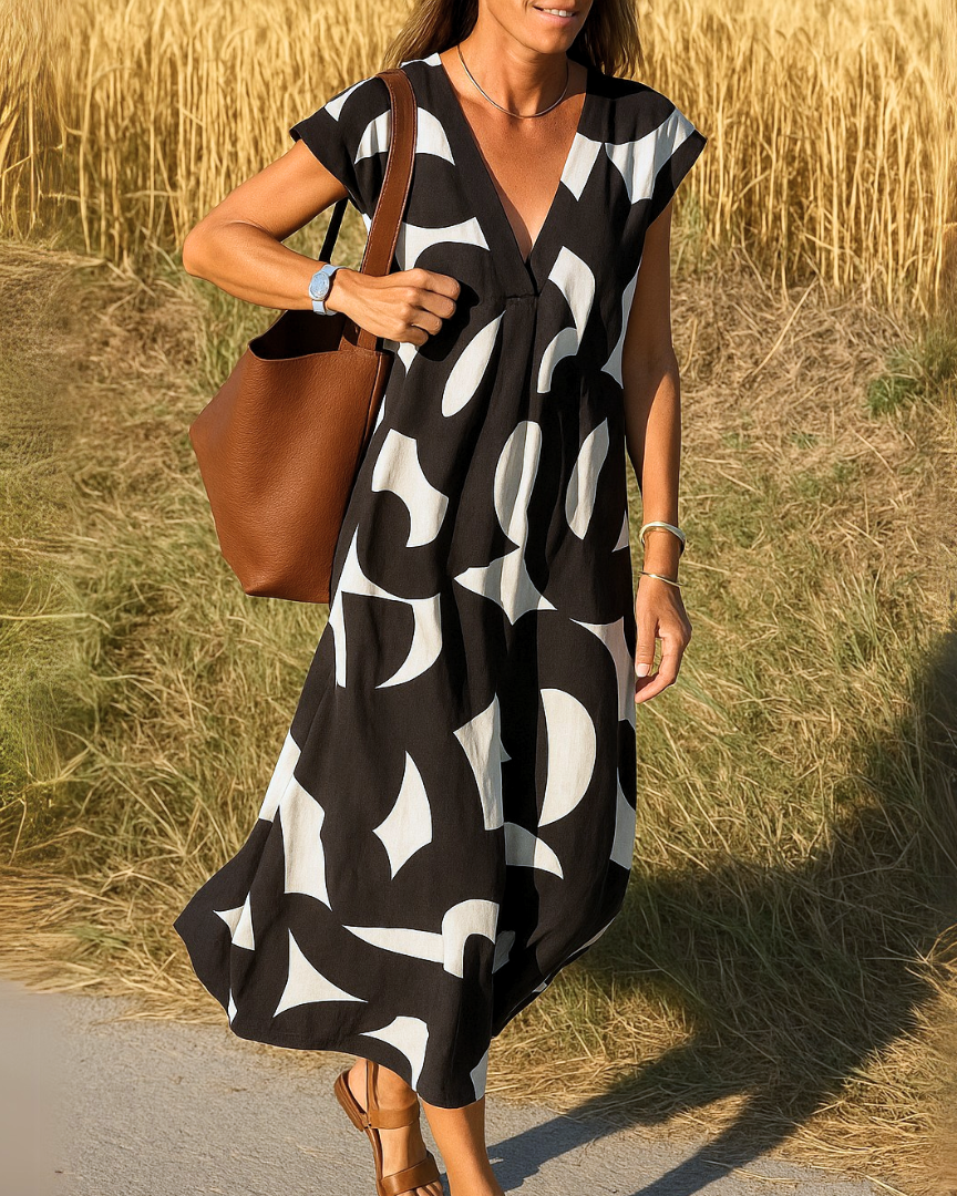 Avena™ | Kjole med flagrende V-hals