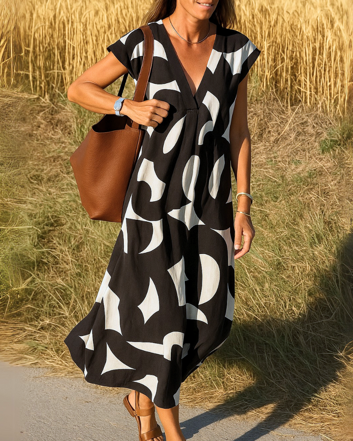 Avena™ | Kjole med flagrende V-hals