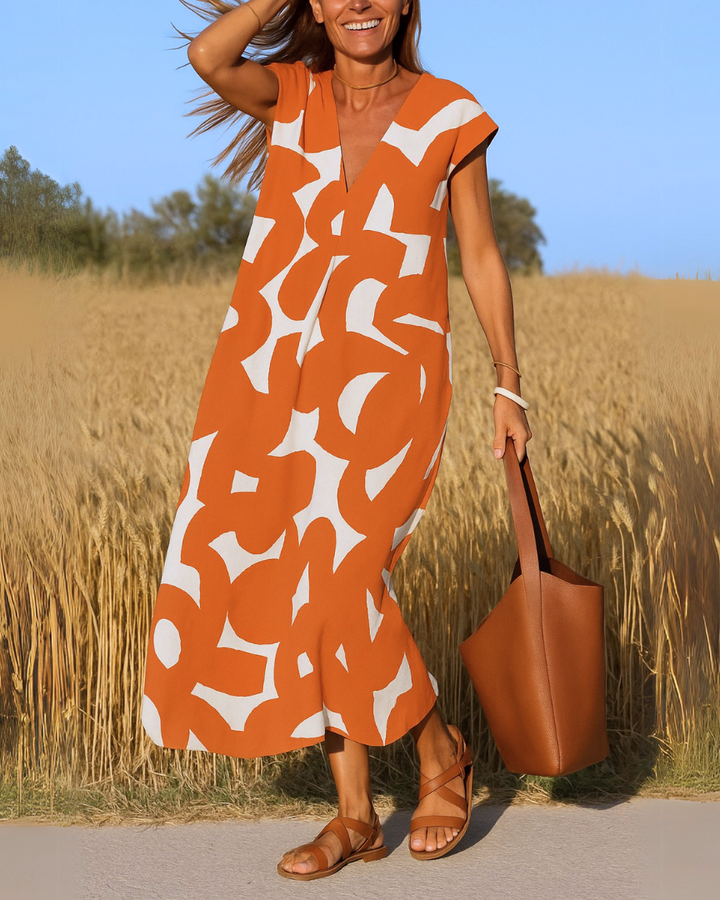 Avena™ | Kjole med flagrende V-hals